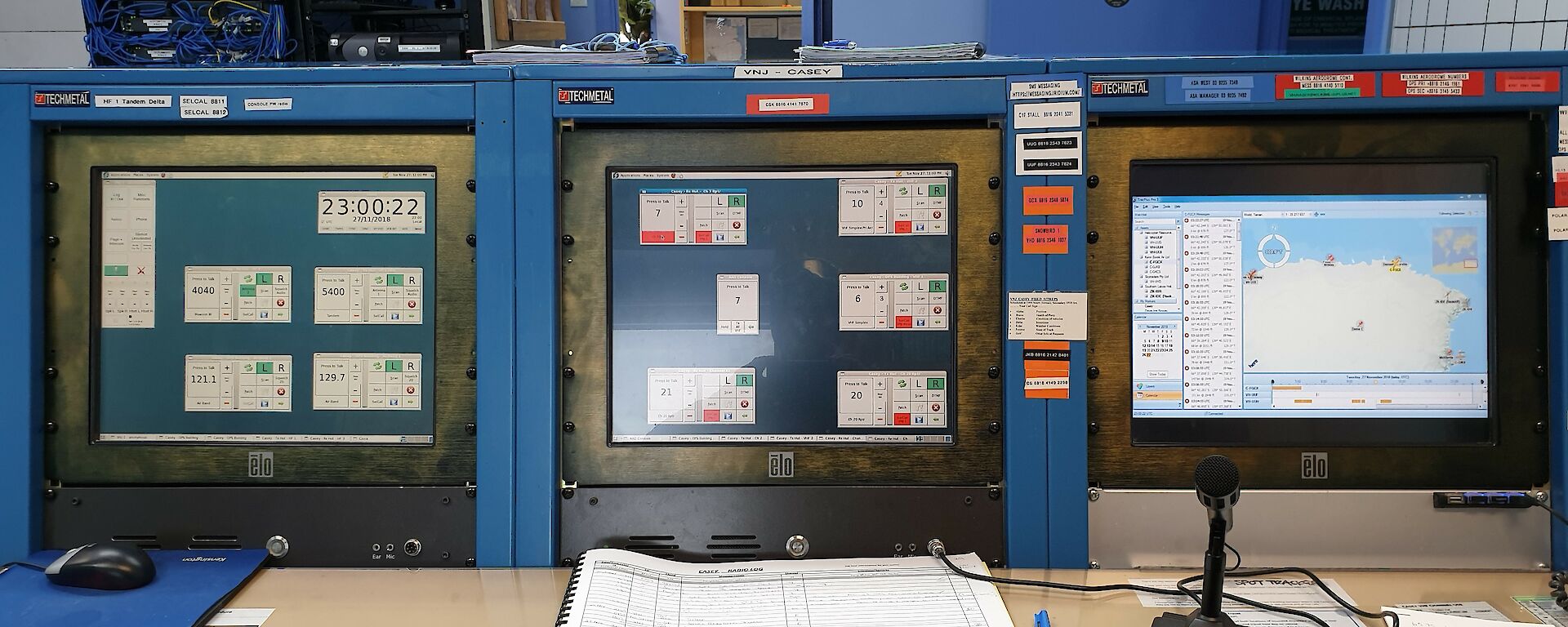 Three screens of Casey’s comms console