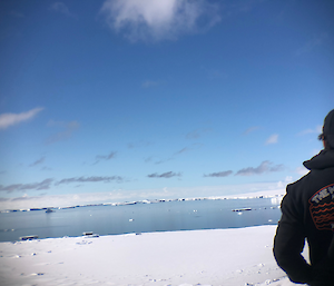 View of the ice and bay with Chris in the foreground