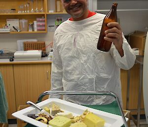 Expeditioner dressed in surgical garb serving drinks