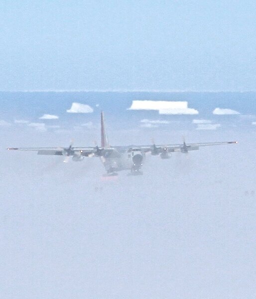 C130 Cargo Aircraft approaching to land on ice ski landing area