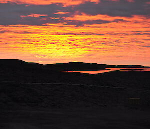 Sunset over a bay off Davis Station