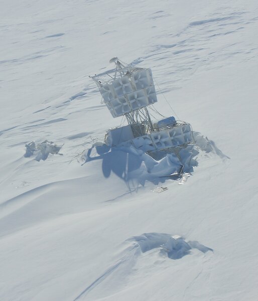Picture of the structure of a NASA high altitude radio wave antenna embedded in snow
