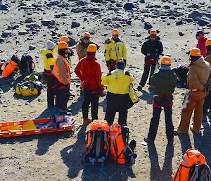 Expeditioners receiving a briefing on search and rescue