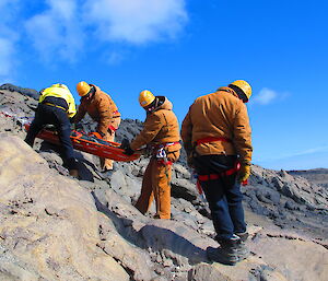 Stretcher being lowered by the team