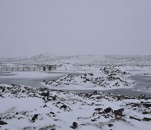 Fresh snowfall on lakes and hills surrounding the station