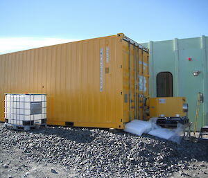 A yellow shipping container