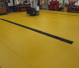 A freshly painted yellow floor