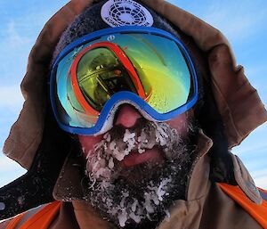 close up of expeditioners face with ice in beard