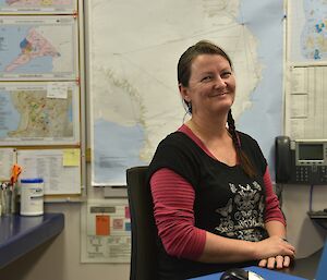 Expeditioner sitting at a comms desk