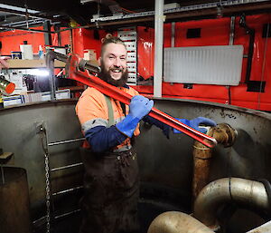 Expeditioner standing in a sewerage tank