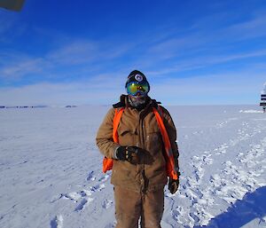 Expeditioner surrounded by snow and ice