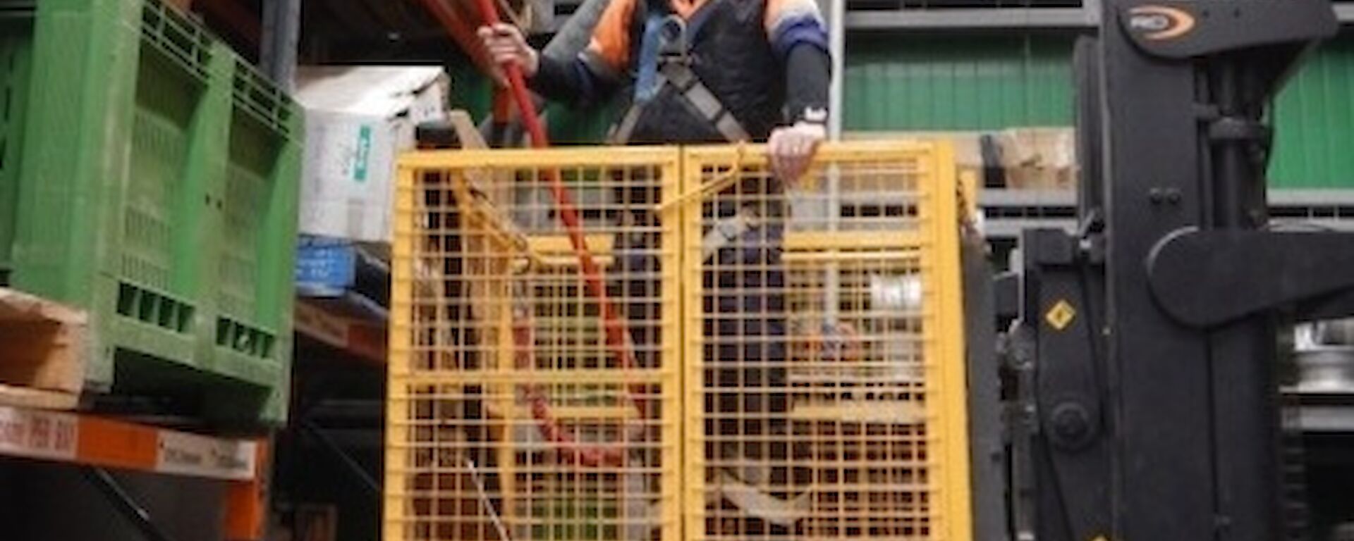 Expeditioners conducting fire checks in the green supply store