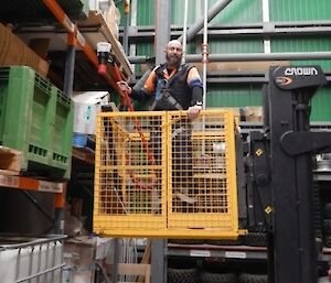 Expeditioners conducting fire checks in the green supply store