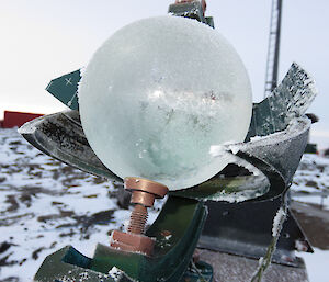 frost on a glass ball which, which reflects light rays and is used to record sunshine