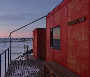 Red hut in foreground right