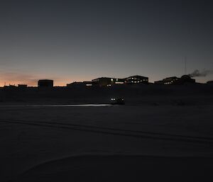 Silhouette shot of station from out on the sea ice