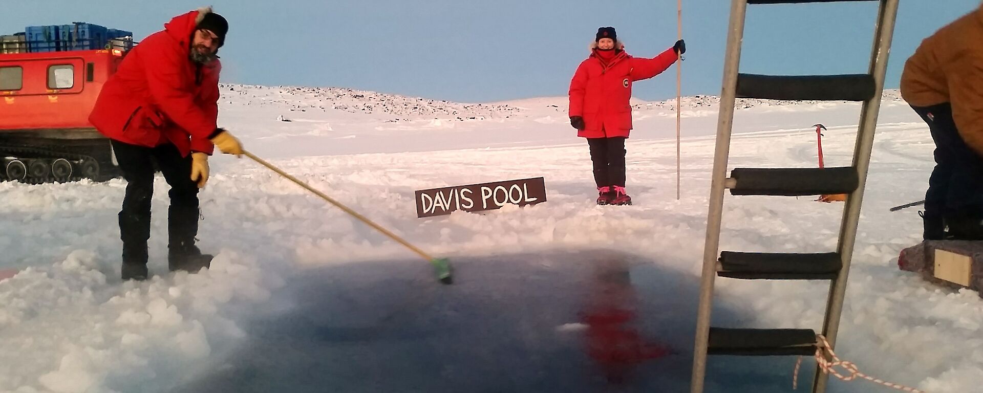 A square hole cut into the sea ice