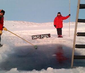 A square hole cut into the sea ice