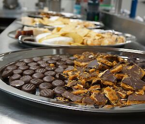 Platters of cheese and platters of peppermint & honeycomb sweets