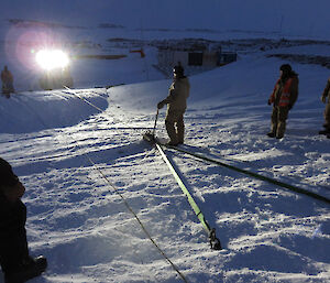 Expeditioners learning Hagg recovery techniques on station