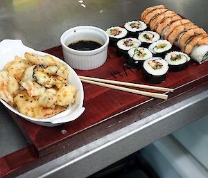 Japanese cuisine prepared and served on a platter