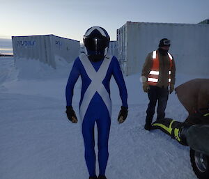 Expeditioner dressed in blue lycra racing suit