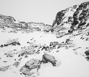 Rocky snow covered terrain on Kazak Island