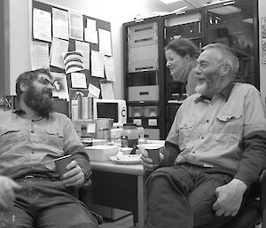Three expeditioners laughing together