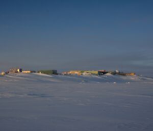 The multicoloured buildings of Davis station, as seen from the sea ice off station.