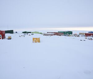 Elevated view of station buildings covered in snow.