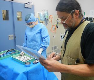 Expeditioner conducting an audit of surgical instruments