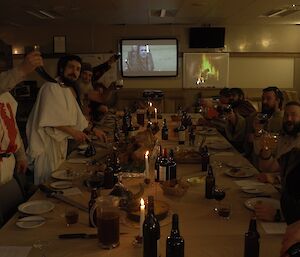 Expeditioners raise a toast during medieval night