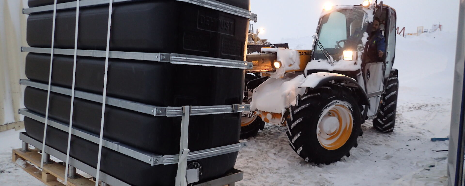 Equipment being carried on a pallet by a forklift