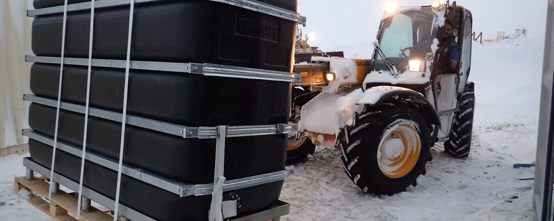 Equipment being carried on a pallet by a forklift