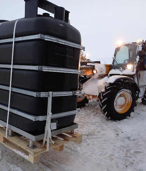 Equipment being carried on a pallet by a forklift