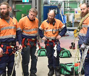 Four expeditioners facing towards camera