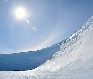 An large amphitheater naturally carved by wind scours of ice
