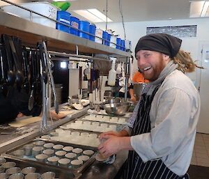 A chef preparing a dish for Saturday night dinner