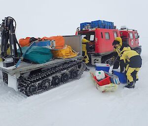 A hagglund trailer with science equipment on the ice
