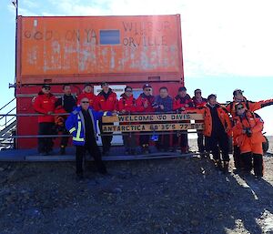 The Chinese visitors posing with the Davis Station Leader for a photo