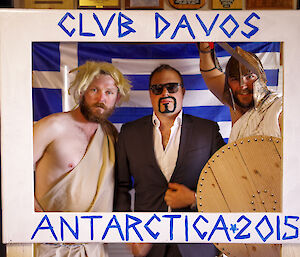 Three expedtioners posing in Greek custume for a photo