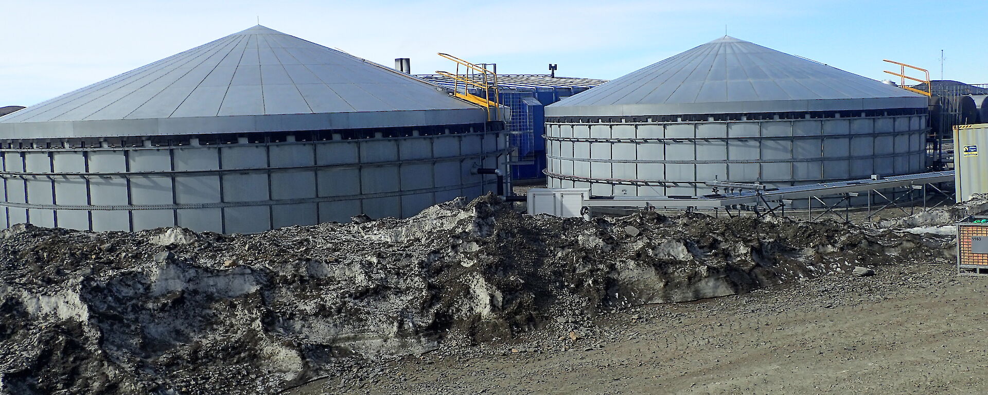 two large external water tanks