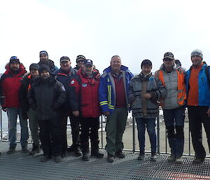 A number of expeditioners posing for a photo at Davis
