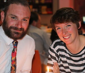 Two expeditioners enjoying dinner