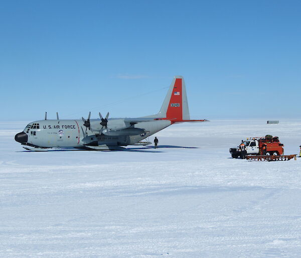 A US C-130 at Wilkins runway ready to depart for Davis Station