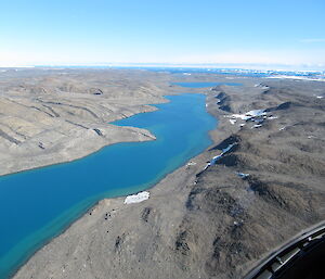 A view of one of the vivid blue lakes in the Vestfold Hills, Lake Stinear, taken from the helicopter ride from the plateau into Davis Station