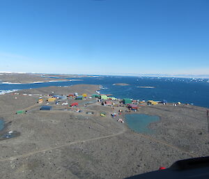 An aerial view of Davis Station at the edge of the Vestfold Hills looking towards the coast