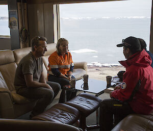 The AAD Director Nick Gales and Davis Station Leader Ali Dean talk with the Zhongshan Station Leader through an interpreter