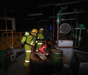 Davis fire team members inside the emergency power house while on an exercise