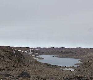 Lake Stinear in the Vestfold Hills reflecting a grey sky